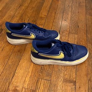 Blue and yellow Nike AF-1s slightly worn, easy to clean up